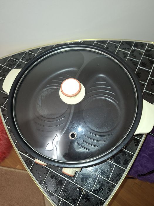 Tigaie multifuncțională