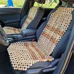 Husă scaun auto cu bile din lemn — masaj, ventilație, confort la condu