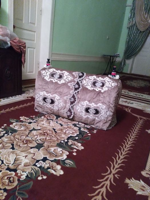 Beshik ustidagi narsalari bilan