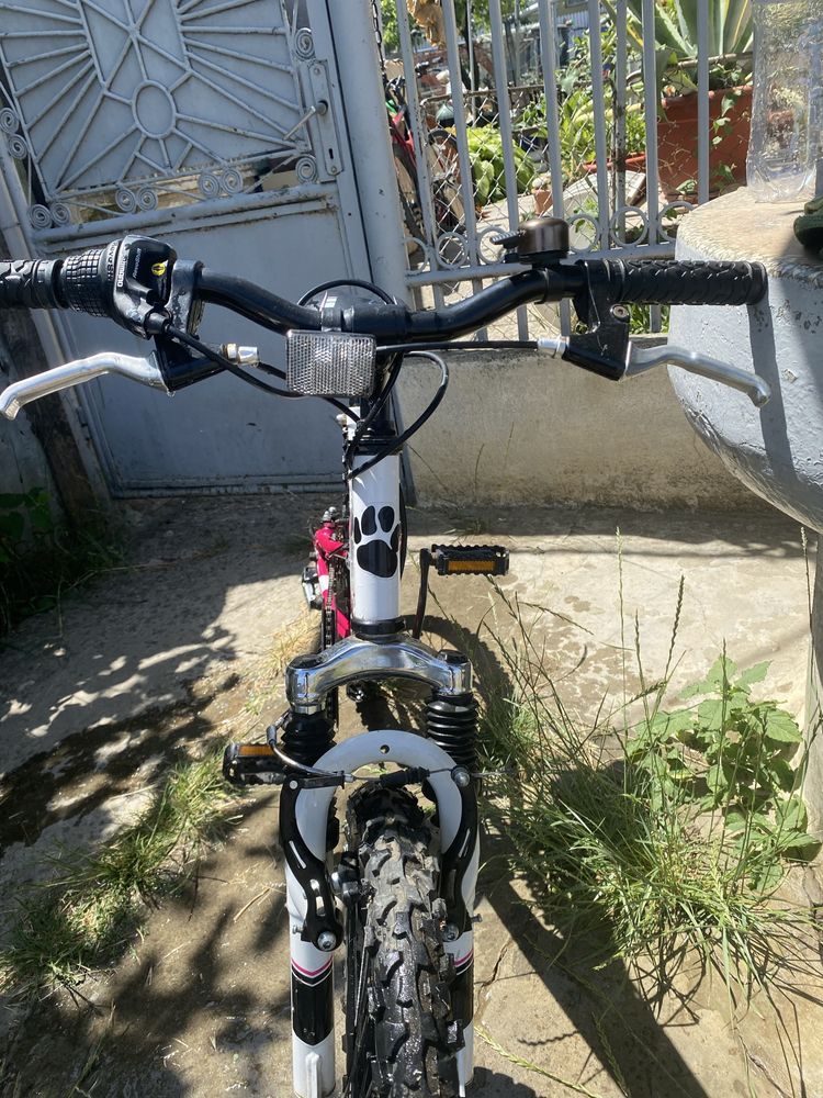 Bicicleta Muddyfox ,de tip mountain bike, cu suspensie completa