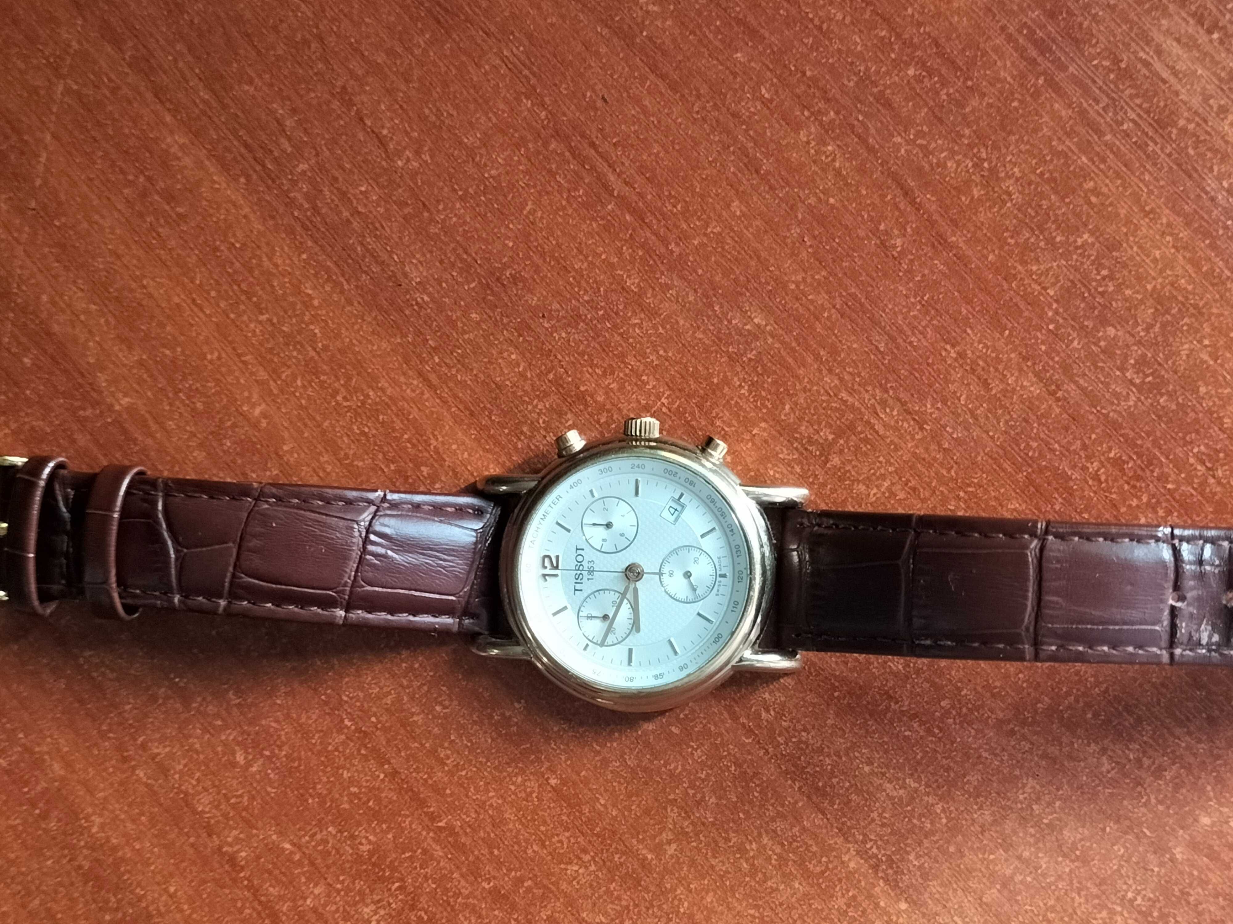 золотые часы TISSOT