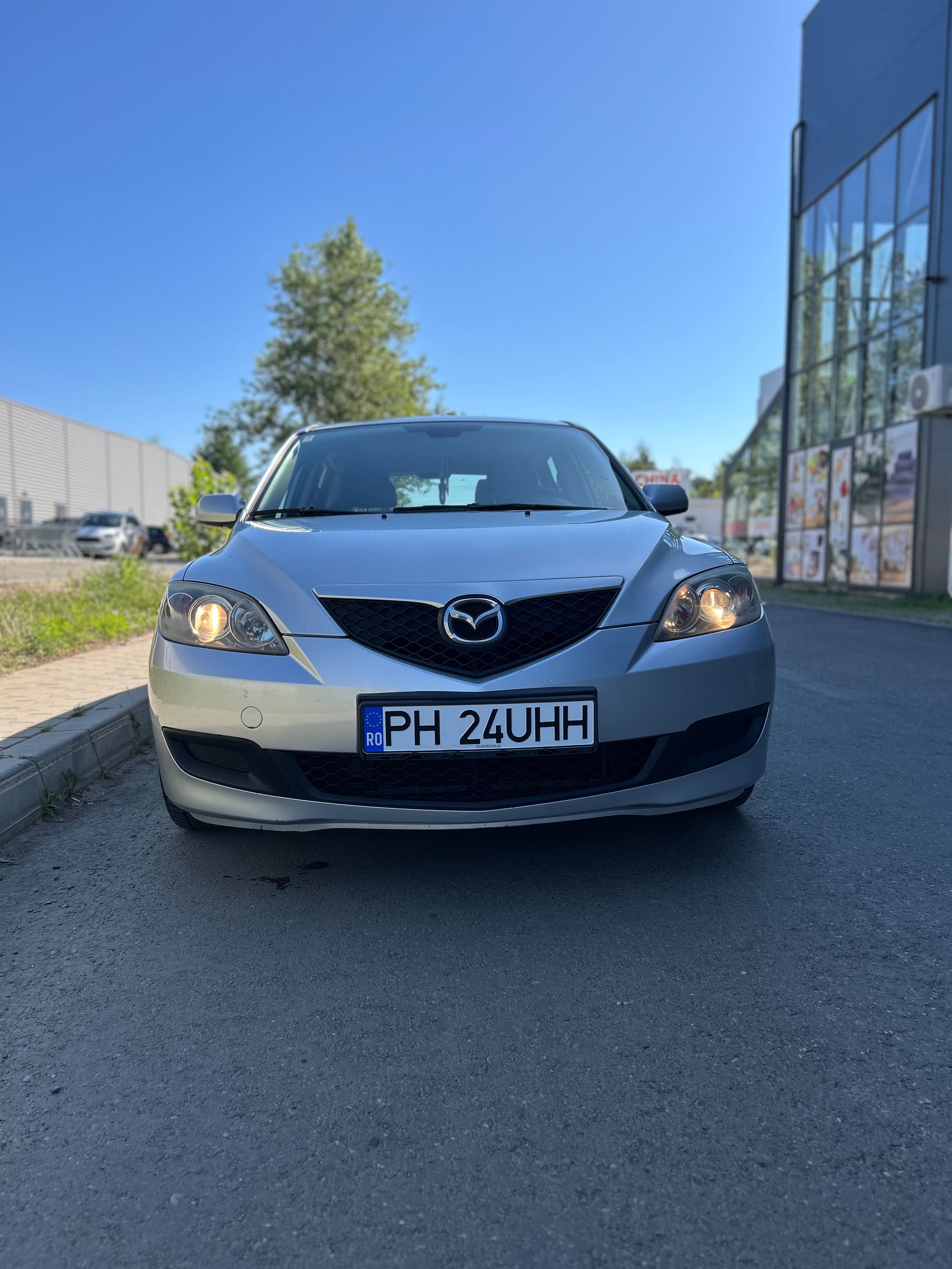 Mazda 3  1,6 benzină .