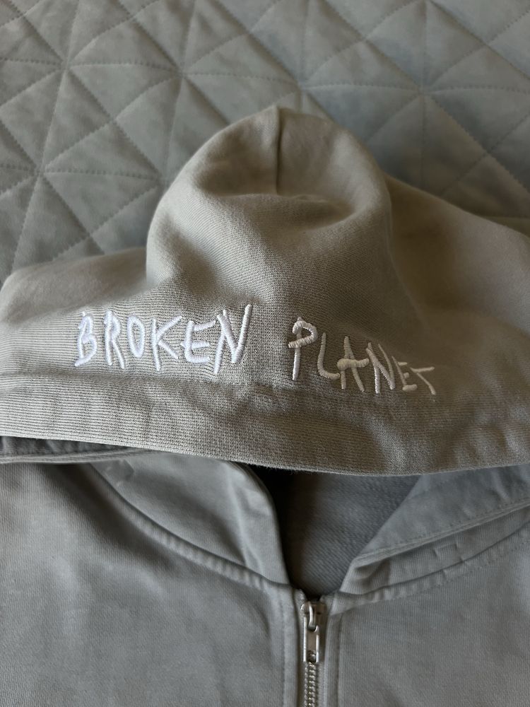 Broken planet planet zip ups