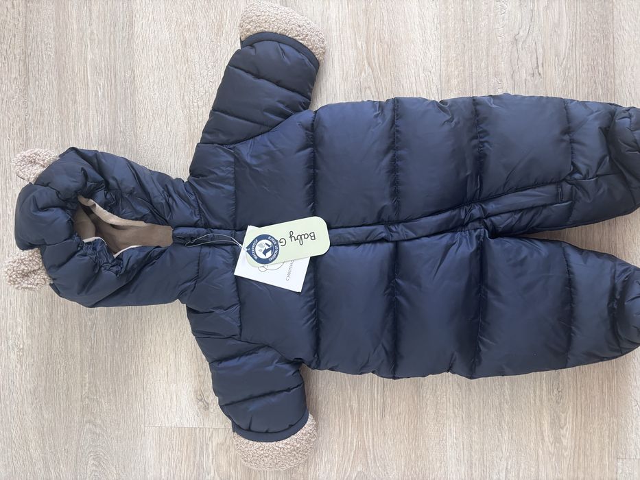 Продам новый комбинезон для новорожденного