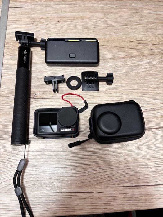 DJI Osmo Action 4  Adventure Combo  Stare impecabila