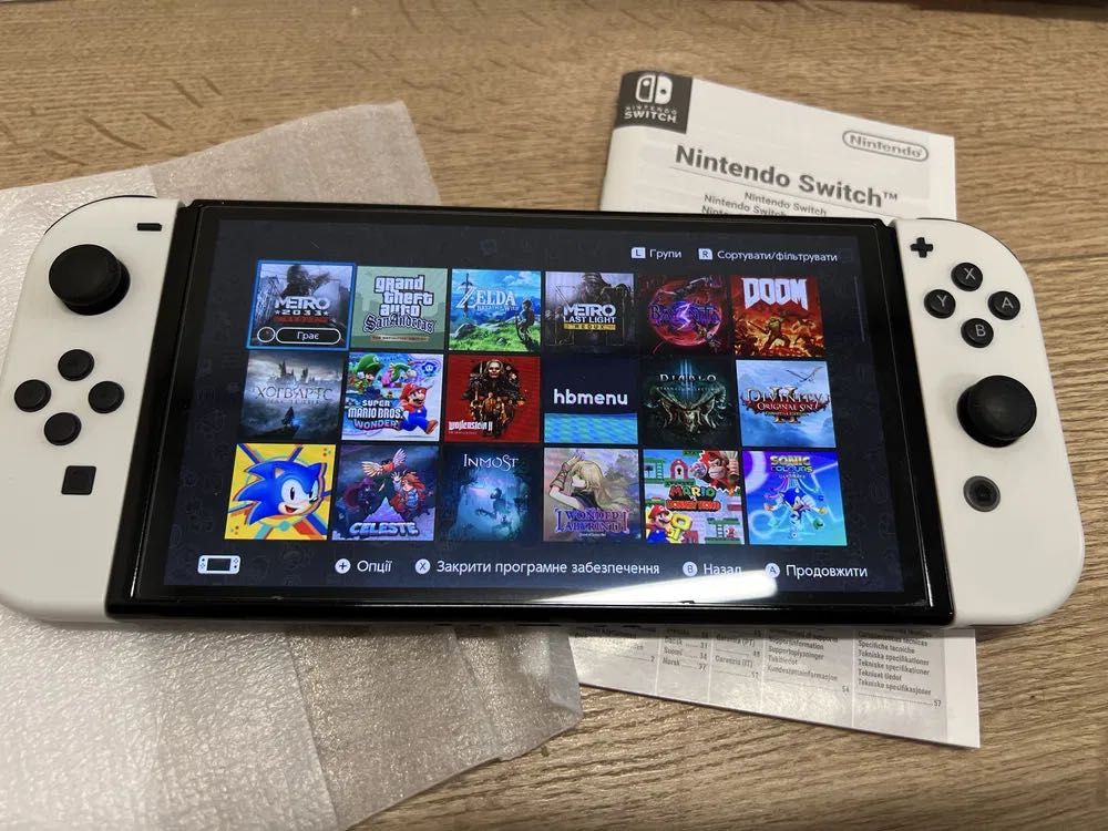 nintendo switch OLED + 35 игри на избор + 512 gb microsd