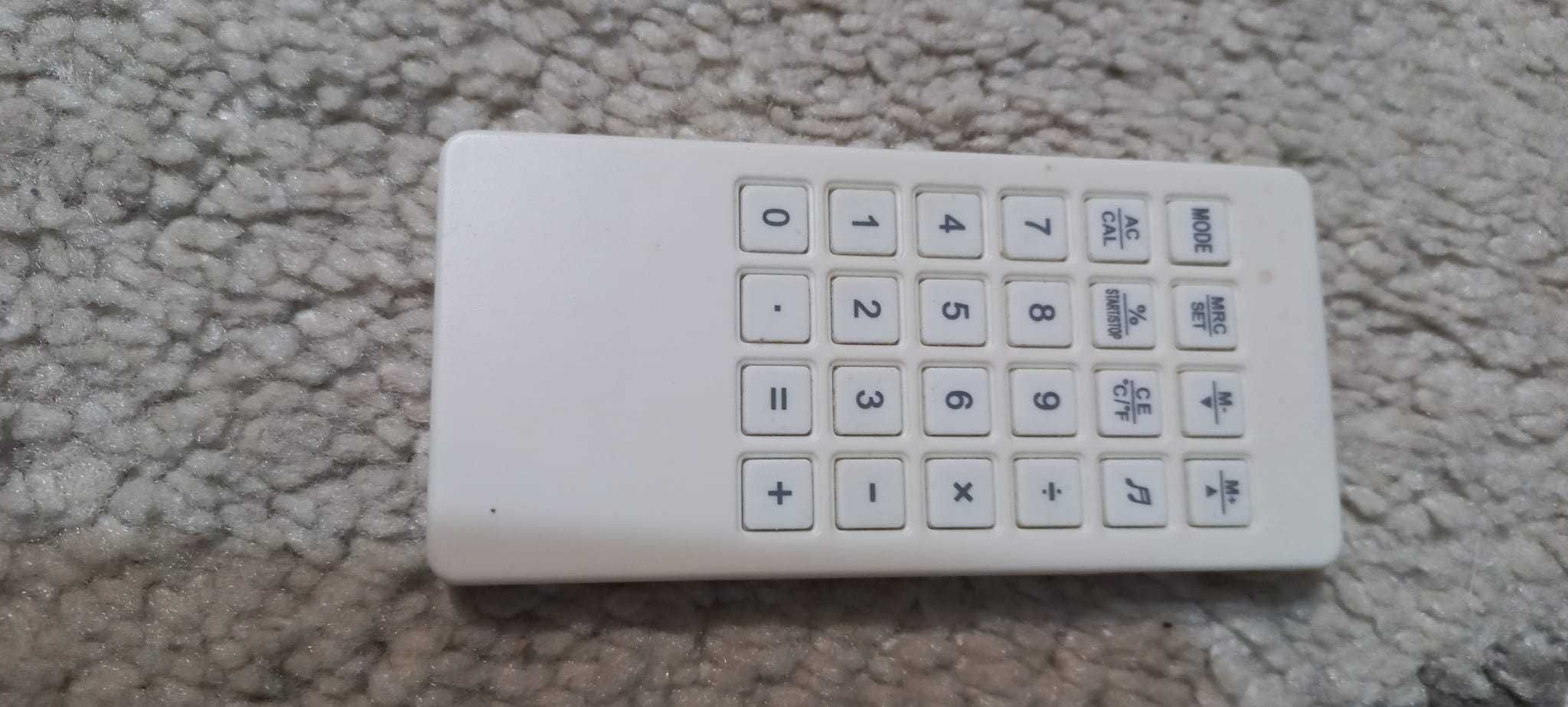 Ceas vintage akai cu calculator și telecomanda