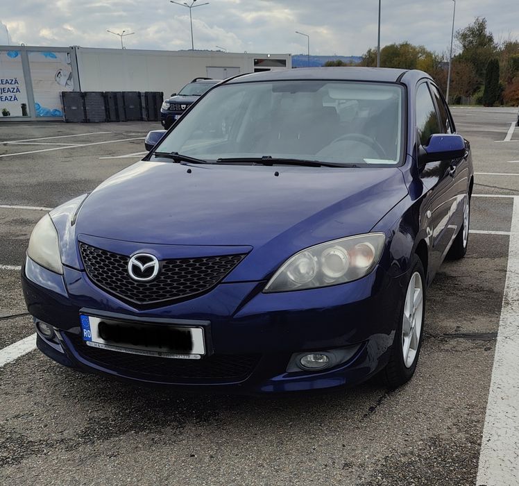 Mazda 3 1.6 benzina 2005 folie geamuri doua seturi de anvelope