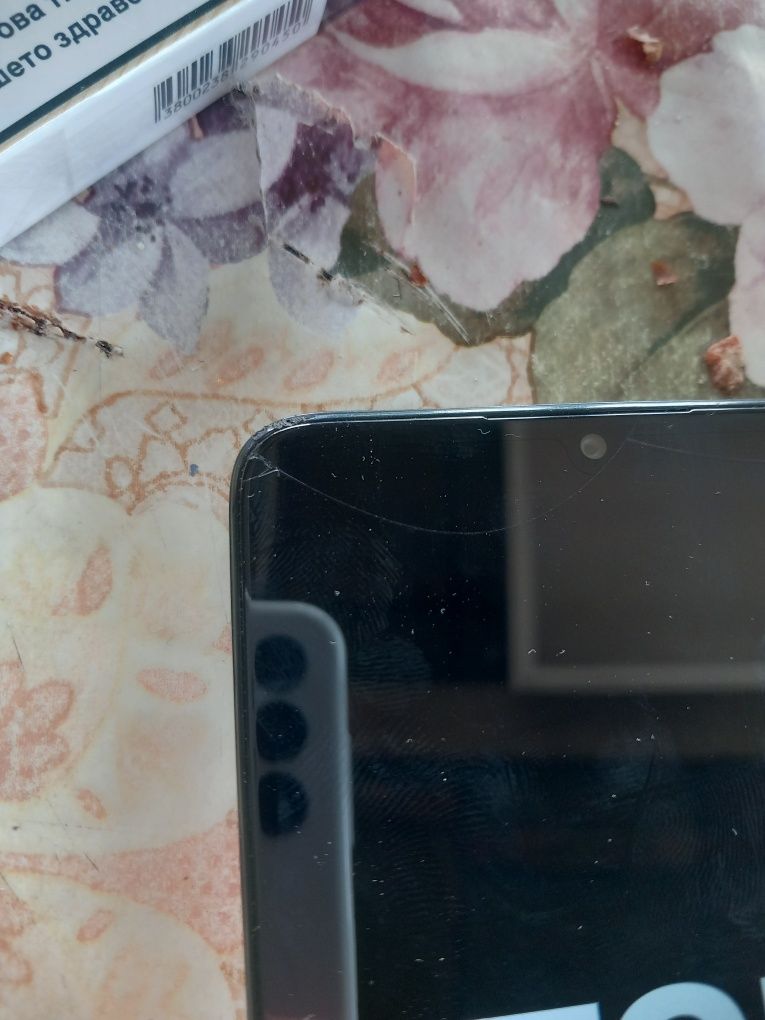 Телефон TCL 505.