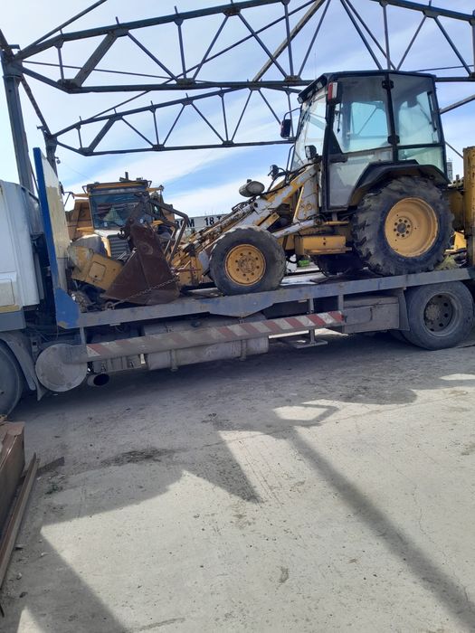 Dezmembrez buldoexcavator ford New  holland