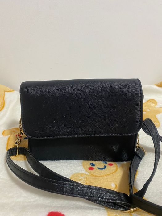 Geanta neagra de umar