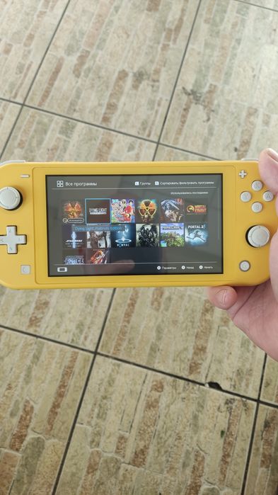 Switch lite в отличном состоянии с кучей игр