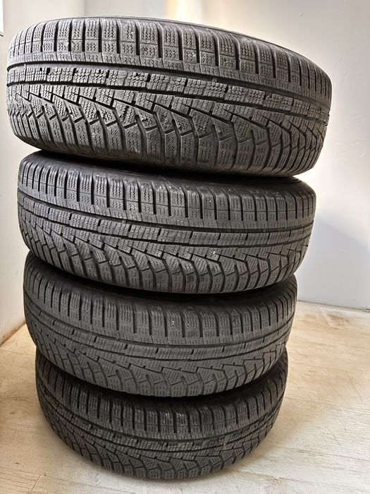 Jante de tablă cu cauciucuri de iarnă 215/70 R16 si capace