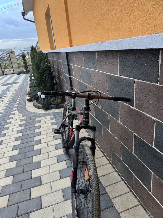 Vând bicicleta ca și nouă