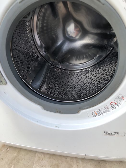 Masina de spalat si uscator de rufe AEG cu pompa de caldura