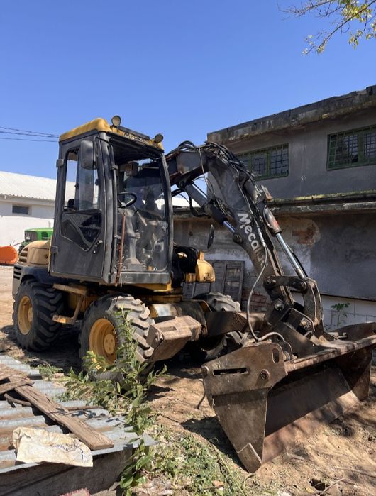 Excavator pe roti de 7.7 tone,Mecalac,posibil variante