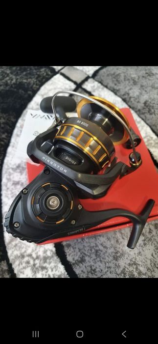 Vând mulineta pescuit somn staționar/spinning greu Daiwa Bg 8000
