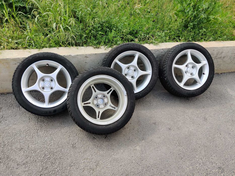 Set 4 jante Enkei 15"–5 spițe, 4 prezoane (4×100) + anvelope 195/50R15