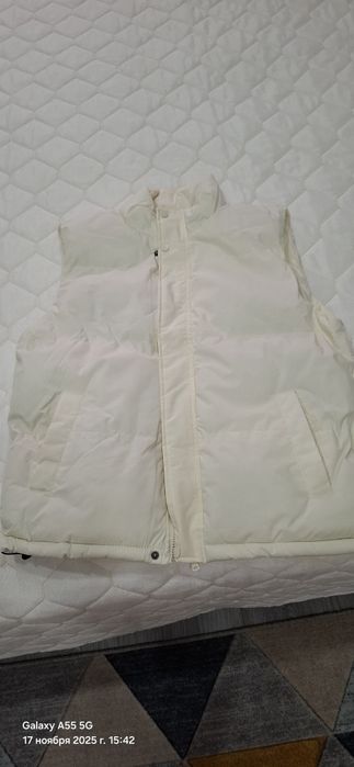 Продам новую жилетку
