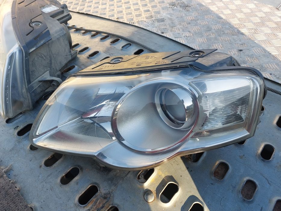 Far faruri halogen h7 vw Passat b6 berlina break Hella Europa