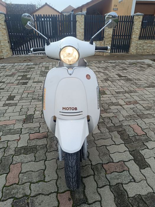Scuter 125cc     .
