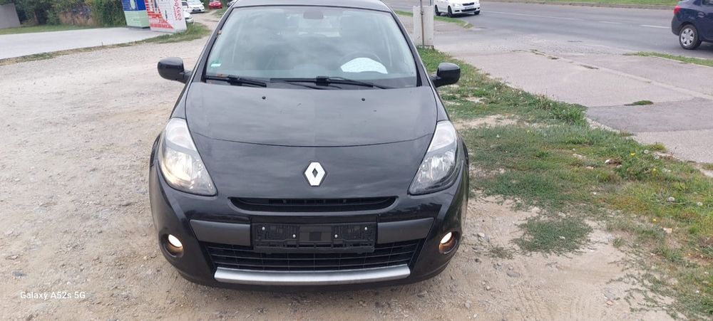 Renault Clio an 2010 cu climatronic benzina cu turbina.