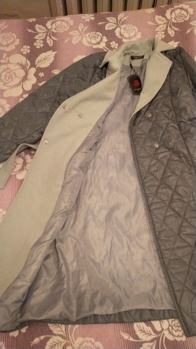 Продам новую куртку 56 размер весенняя