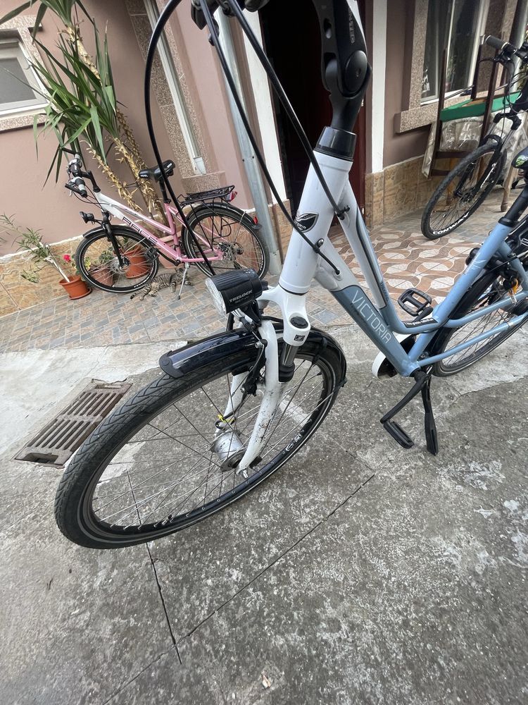 Bicicleta de dama cu suspensie