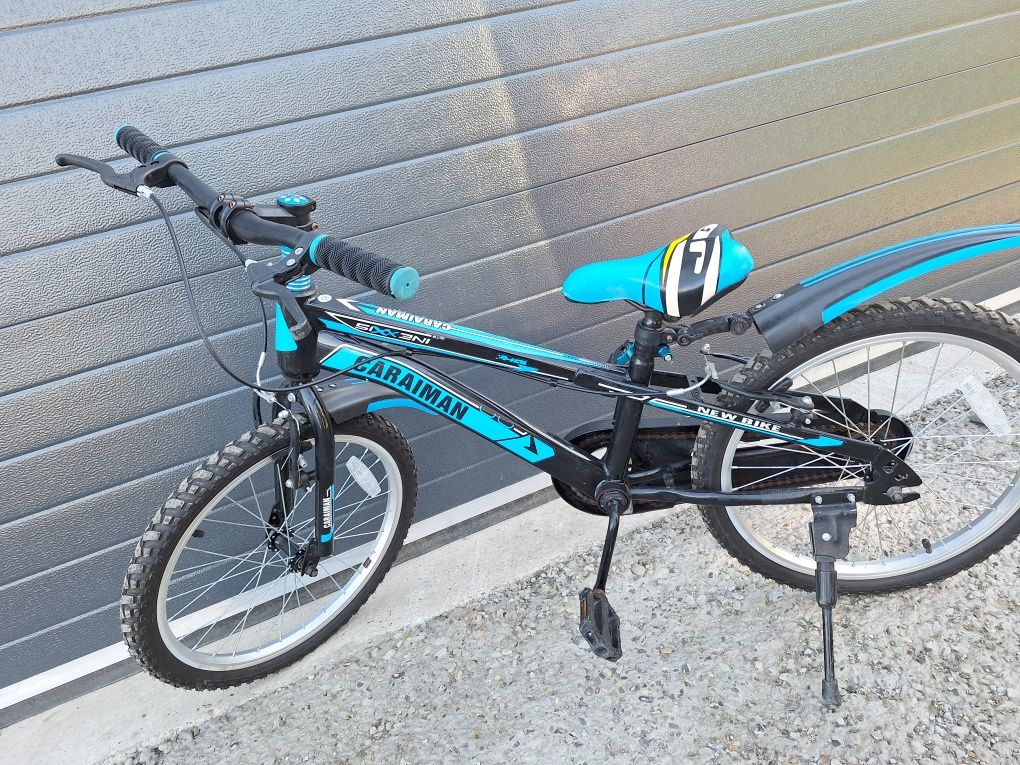 Bicicleta  cu roti pe 20 pentru copii 6-10 ani