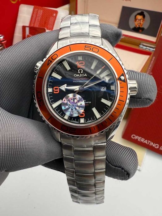 omega seamaster planetocean сребристо / оранжево