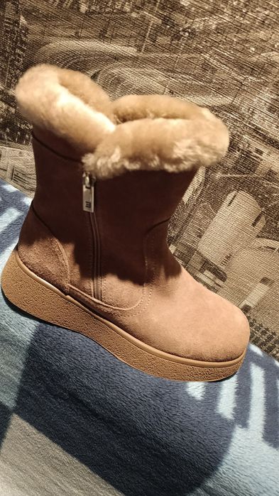 Продам натуральные женские сапоги