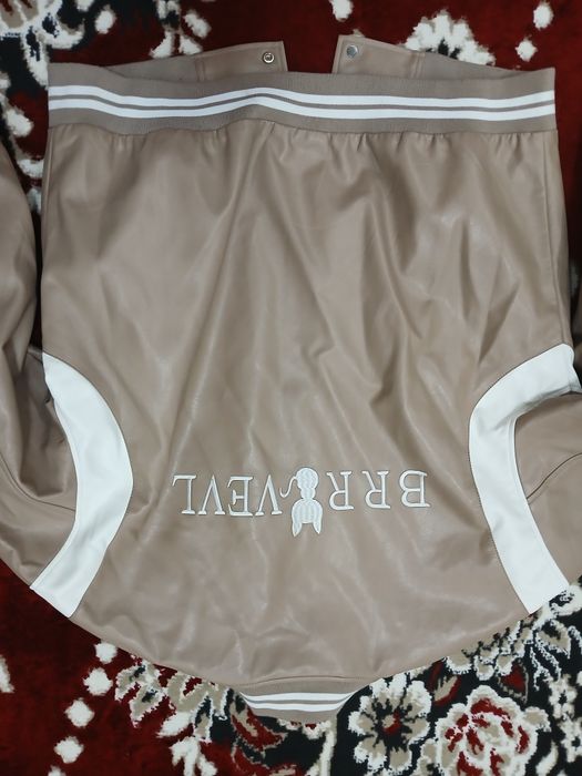 Лазерный юбка россиский.кожа куртка лёгкий удобный.осенный