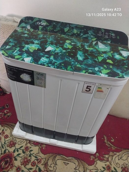 Yangi ishlatilmagan kir moshina