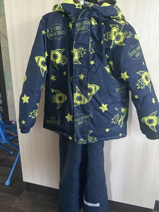 Комбинезон зимний в отличном состоянии.