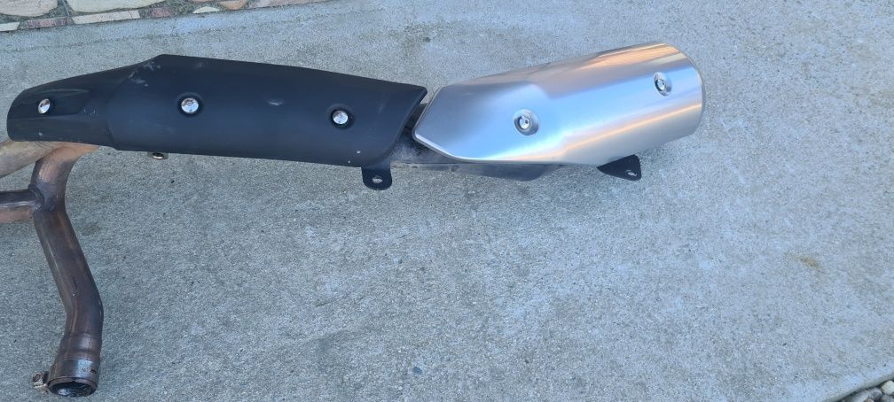Vând evacuare completa originală Suzuki Vstrom 650