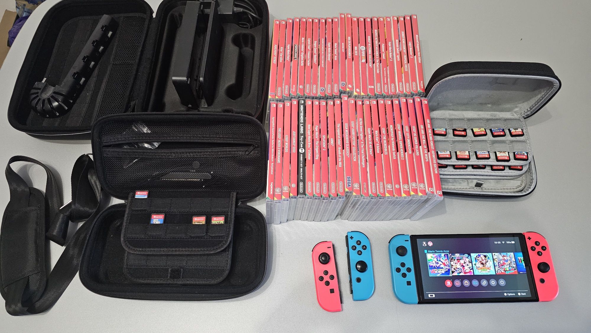 Vannd Nintendo Switch Oled+44 jocuri+Extra JoyCon+Travel Case+Carry