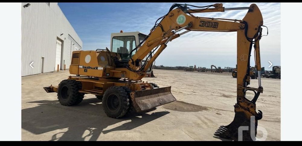 Excavator Liebherr pe roți
