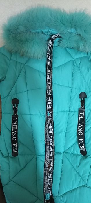 Продам пуховик новый