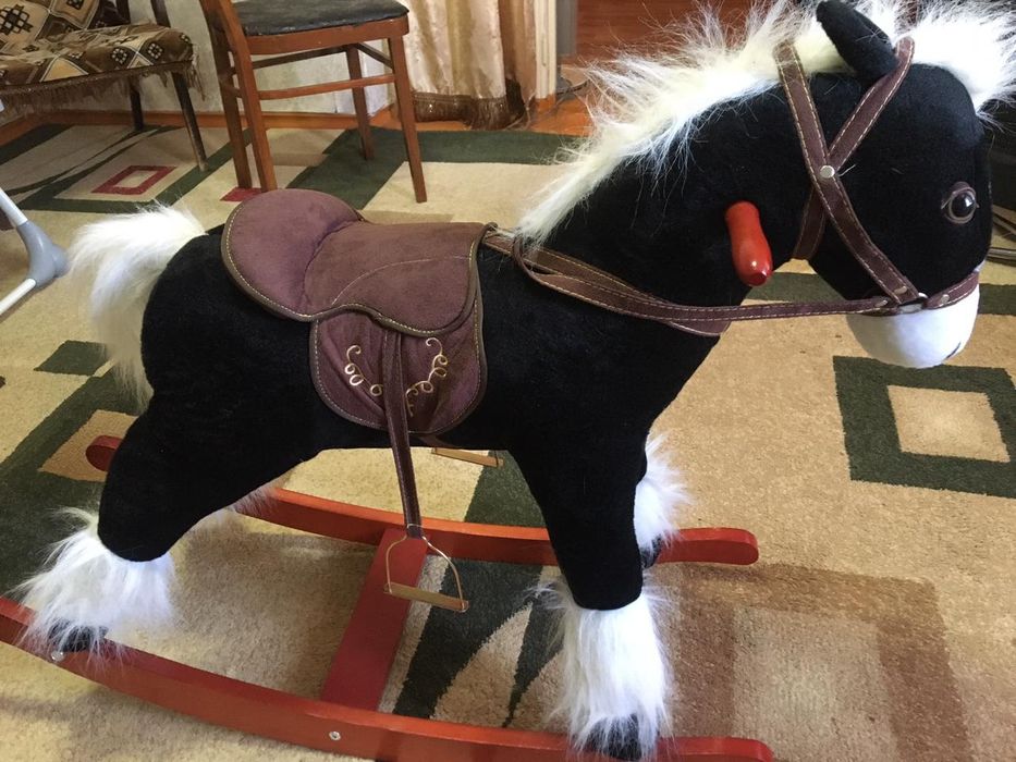 Лошадка мызыкальная игрушка новая