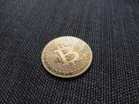 Monedă Bitcoin aurie