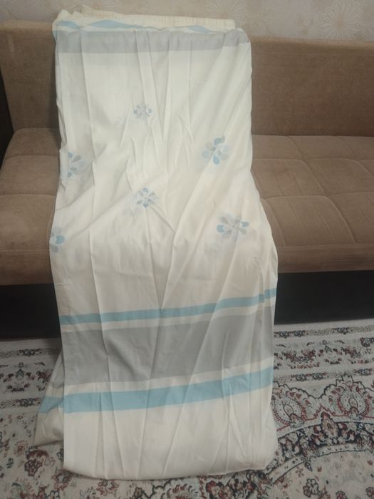 Шторы новые  2 штуки