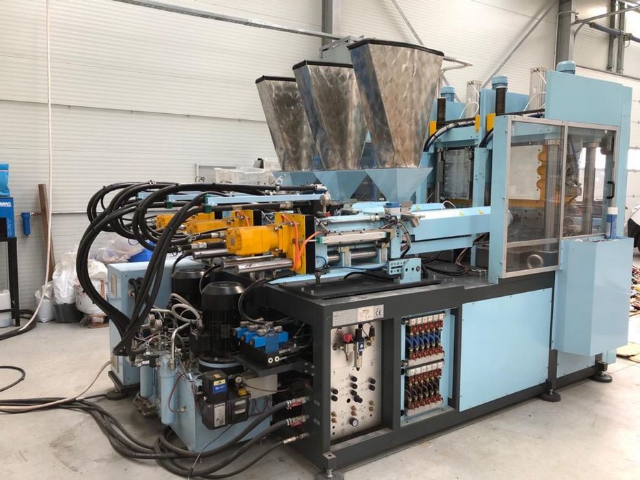 Masina de turnat plastic si cauciuc