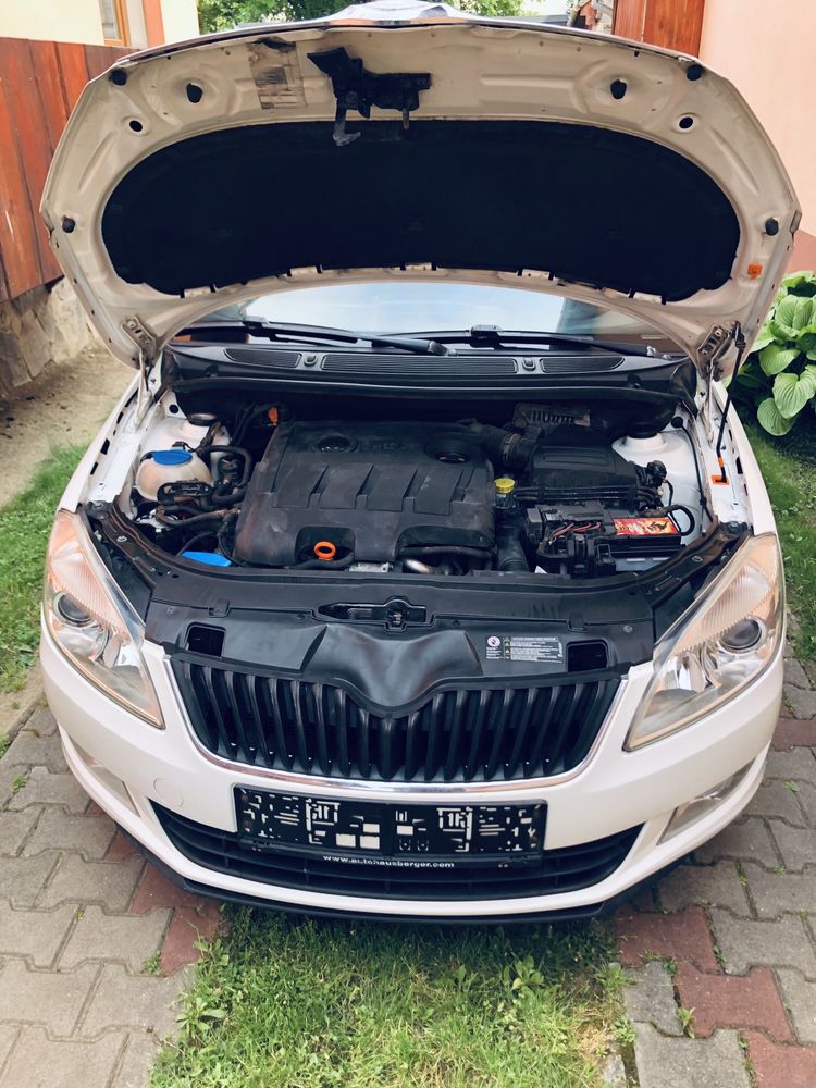 Skoda fabia 1.6 tdi,105 cp,an 2012,clima functionabil,navigatie.