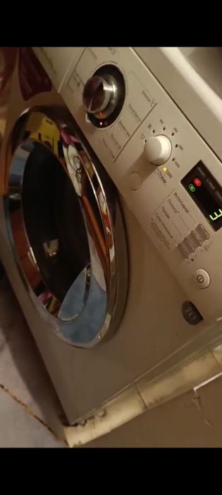 Стиральная машина, шумит но работает