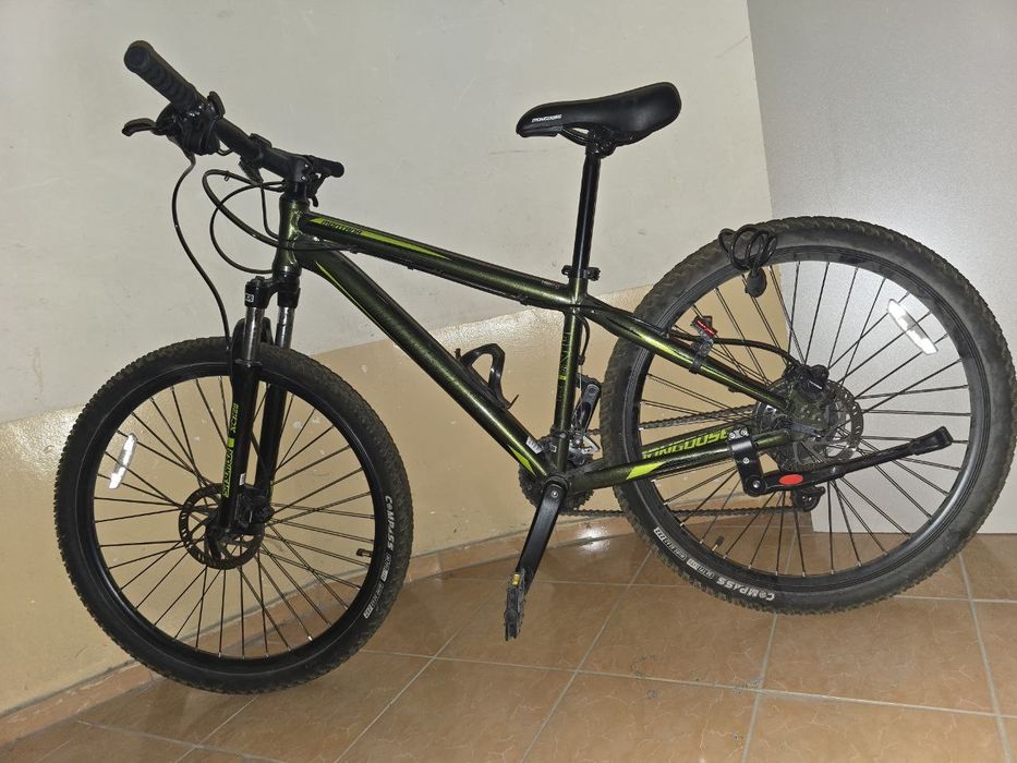 Спортивный велосипед, фирма mongoose зелёного цвета