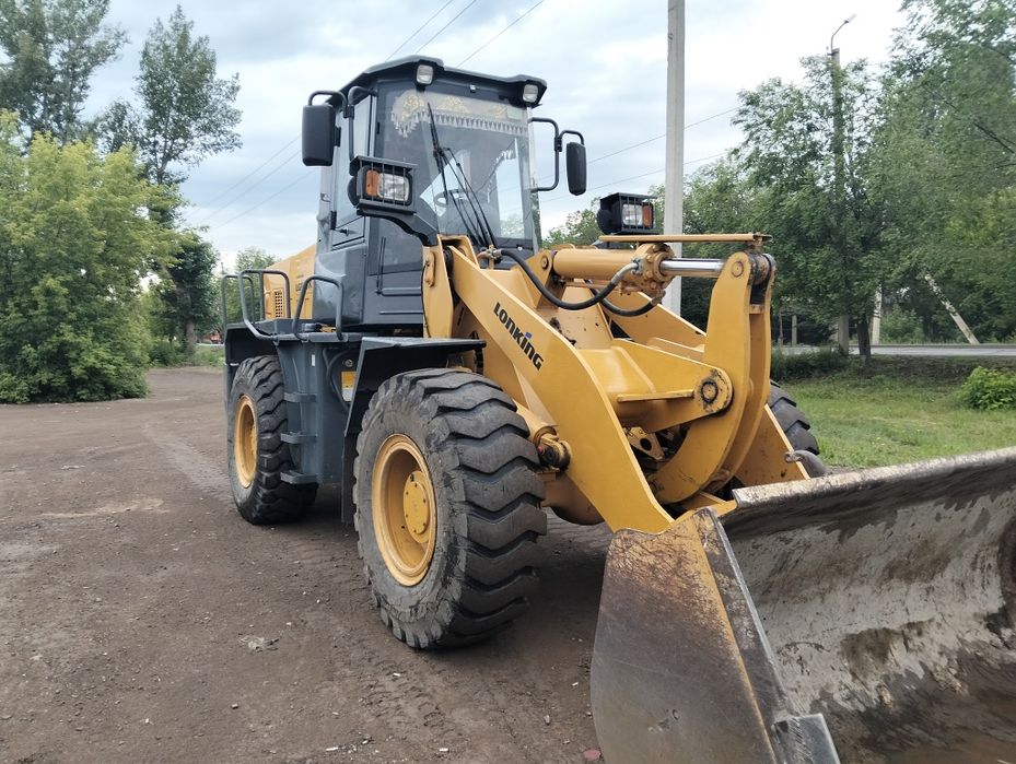 Погрузчик снег вывоз