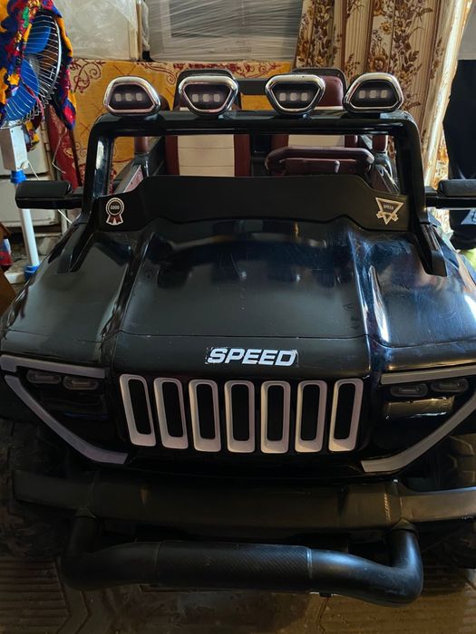 Детская электромашина с пультом управления