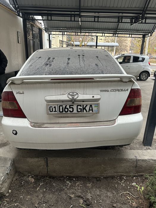 Тойота королла 2002 года