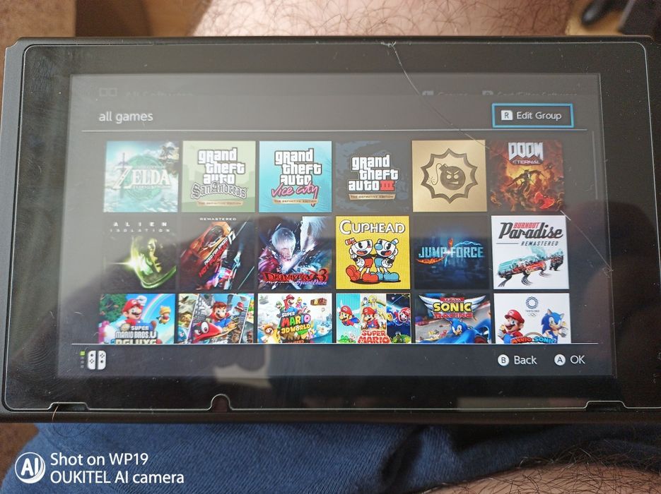 Vând nintendo switch oled card 512gb MODAT full cu jocuri