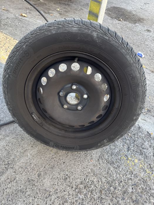 Vand 4 roti de iarna r15 ,5x112 cu capace